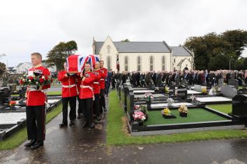 Major Robert Wilmont MBE is buried with full military honours