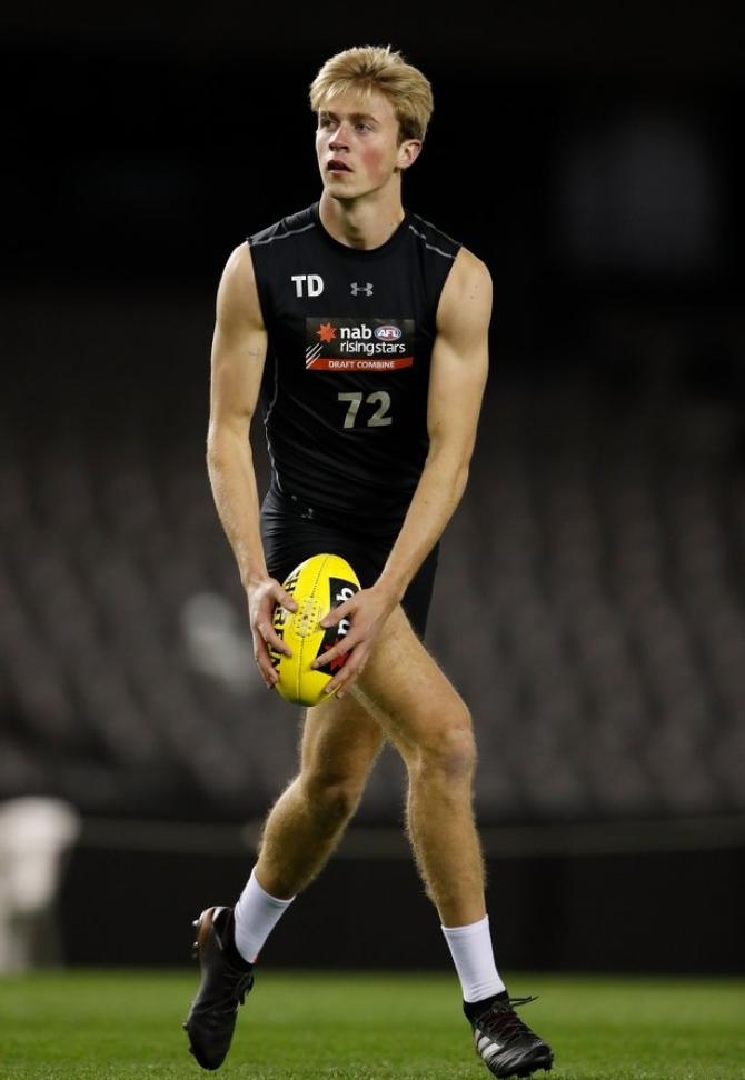 Anton Tohill waves goodbye to Aussie Rules